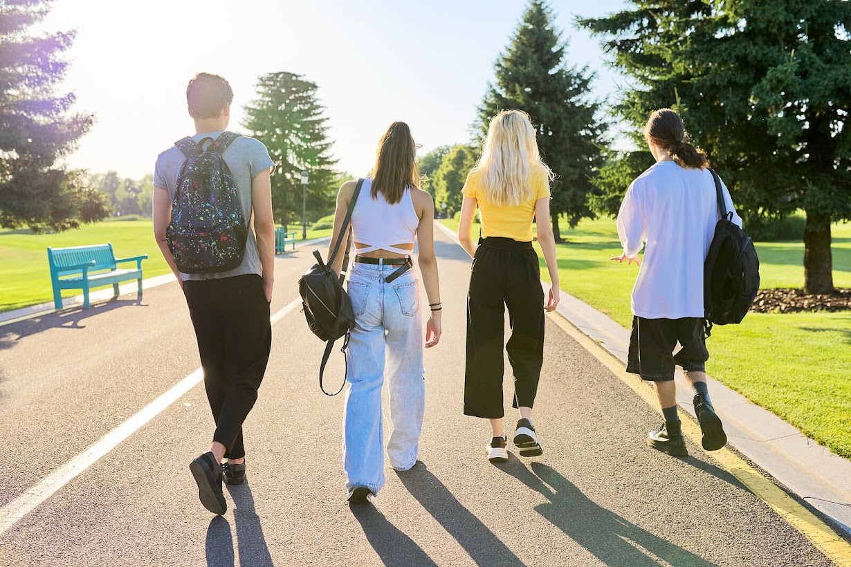 Image of group of teens walking on a street. Social Anxiety is something teens struggle with. Counseling for Teenage Therapy in Kent County, MI can help prepare and cope for daily life. Speak to our therapists in Grand Rapids, Michigan.